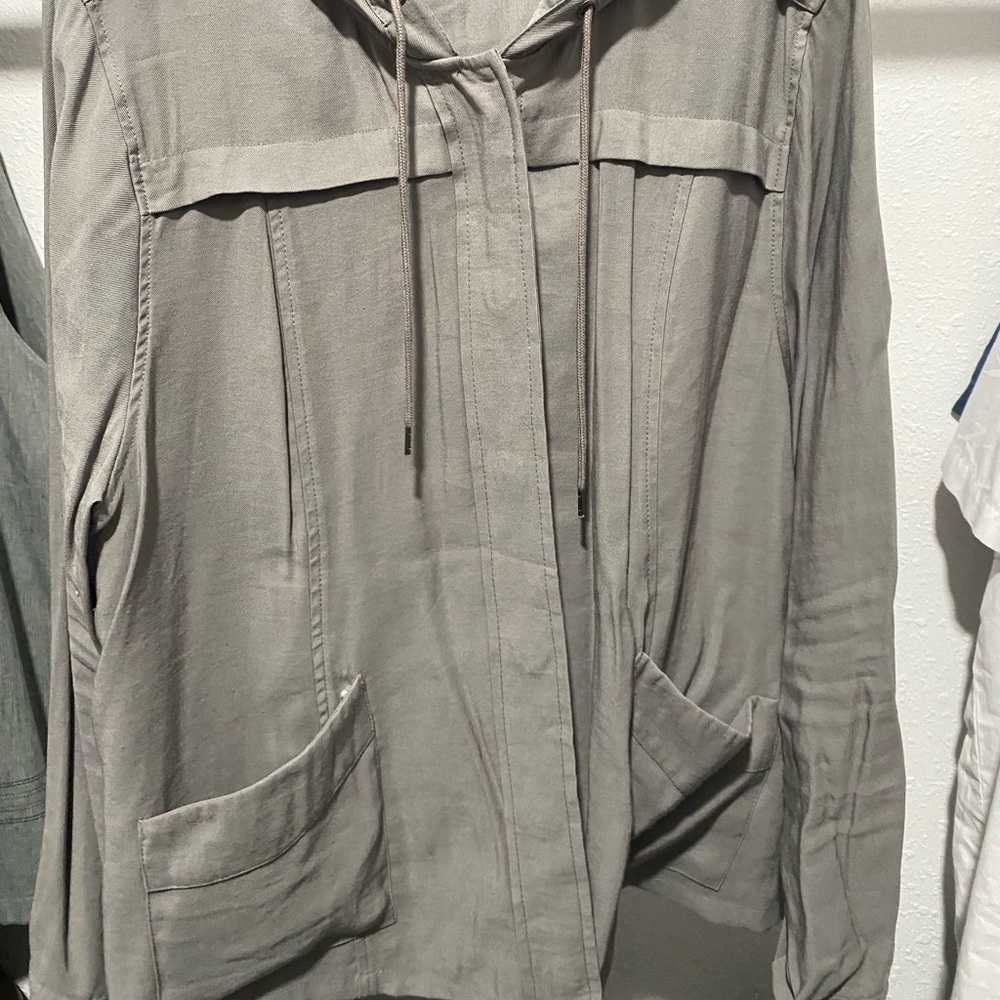 New without tags Torrid grey front snap jacket with a hood